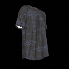 Right side of black t-shirt with blue floral patterns on a black background