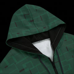 Front top of green patterned hoodie on a black background