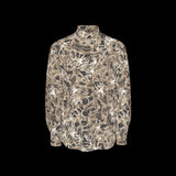 Front of a camouflage-patterned long sleeve shirt on a black background