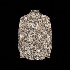 Front of a camouflage-patterned long sleeve shirt on a black background